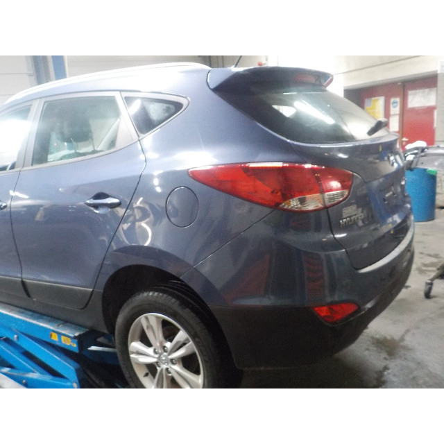 Zacisk hamulcowy tylny lewy Hyundai iX35 (LM) (2010 - 2015) SUV 1.7 CRDi 16V (D4FD)